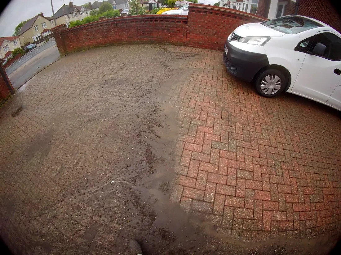 Driveway pressure washing before and after clean